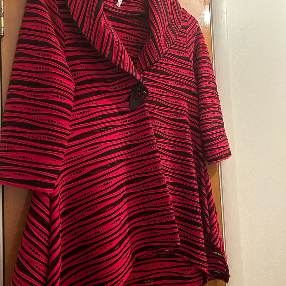 Red and black jacket with one big button down front